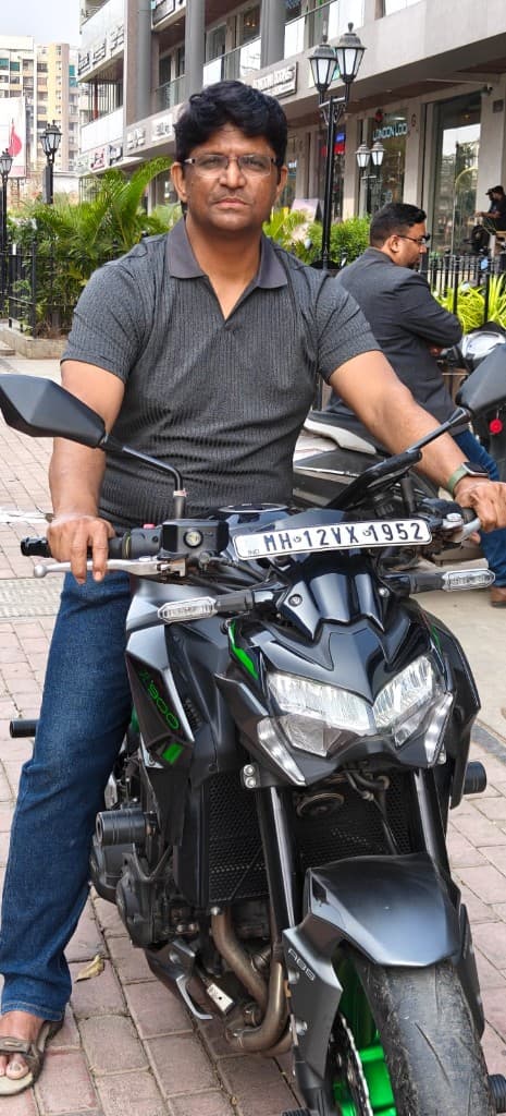 Rakesh Ghumatkar with motorcycle